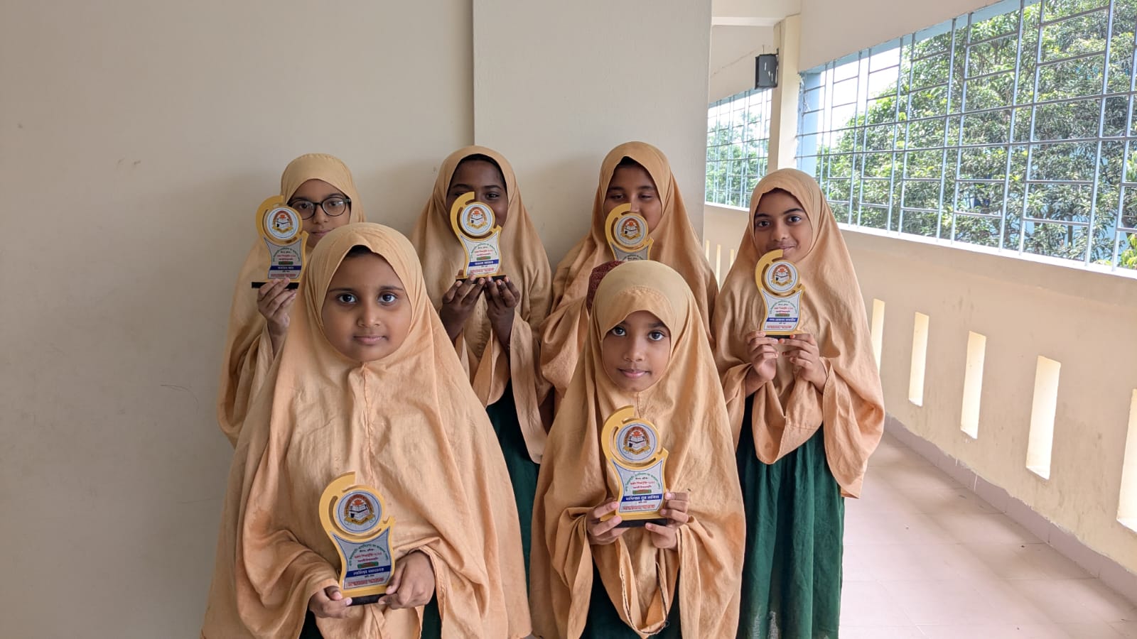 Crests and gifts presented to students