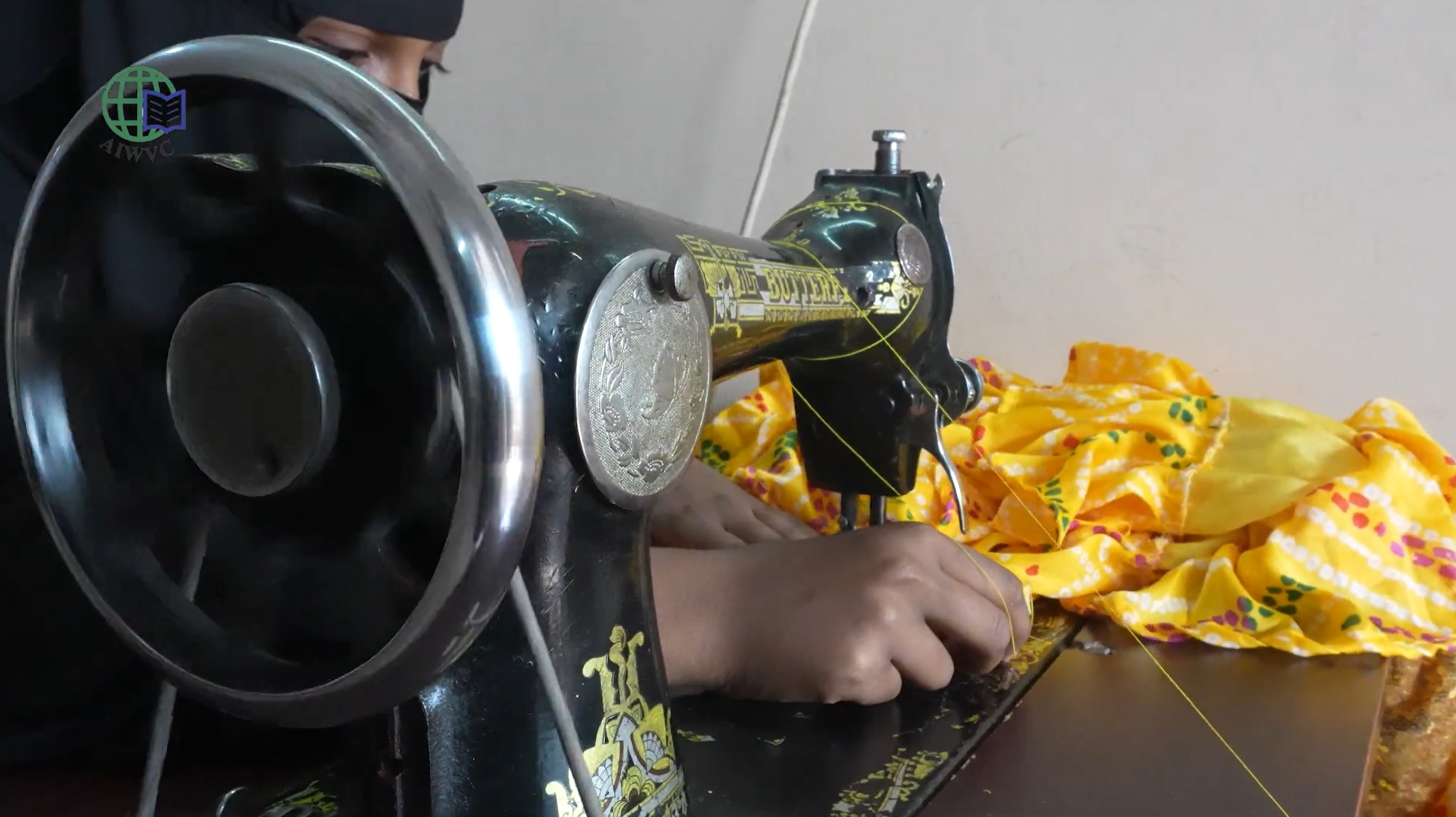 Students stitching Eid dresses